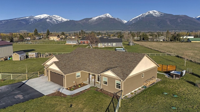 drone / aerial view featuring a mountain view