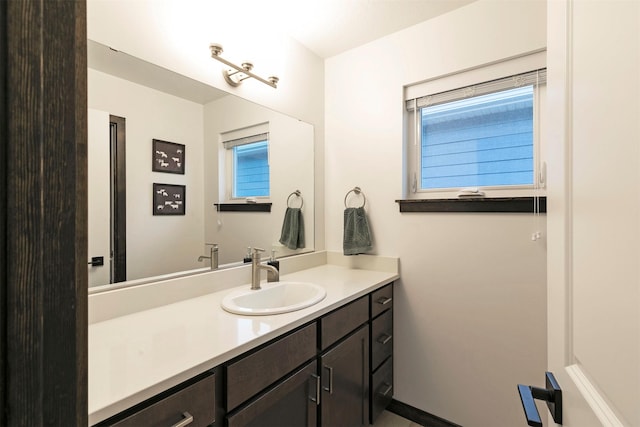 bathroom featuring vanity and plenty of natural light