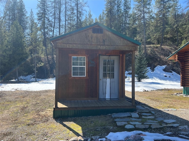 557 Crows Nest Main St, Haugan, MT 59842 - view of outdoor structure featuring a view of trees and an outbuilding