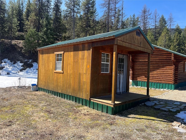 557 Crows Nest Main St, Haugan, MT 59842 - view of outdoor structure with a wooded view and an outbuilding