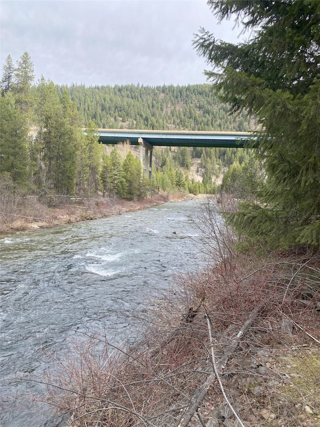 557 Crows Nest Main St, Haugan, MT 59842 - exterior space with a wooded view