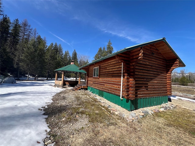 557 Crows Nest Main St, Haugan, MT 59842 - view of home's exterior with log exterior and a gazebo