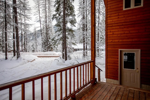 view of snow covered deck
