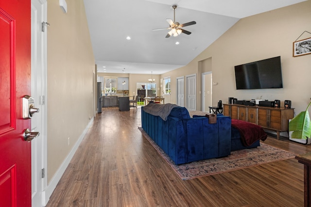 living room featuring wood finished floors, baseboards, high vaulted ceiling, recessed lighting, and a ceiling fan