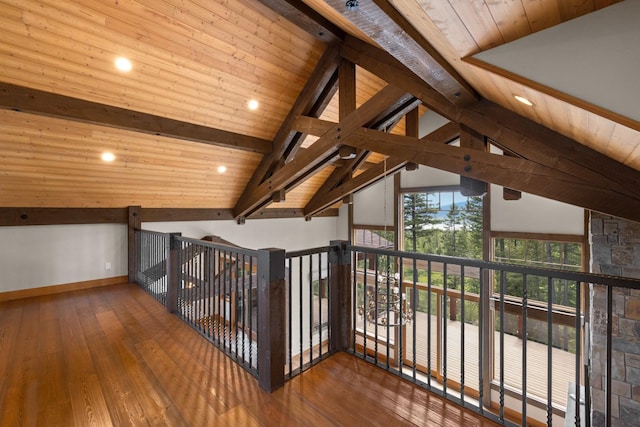 bonus room featuring wood-type flooring, baseboards, and wooden ceiling