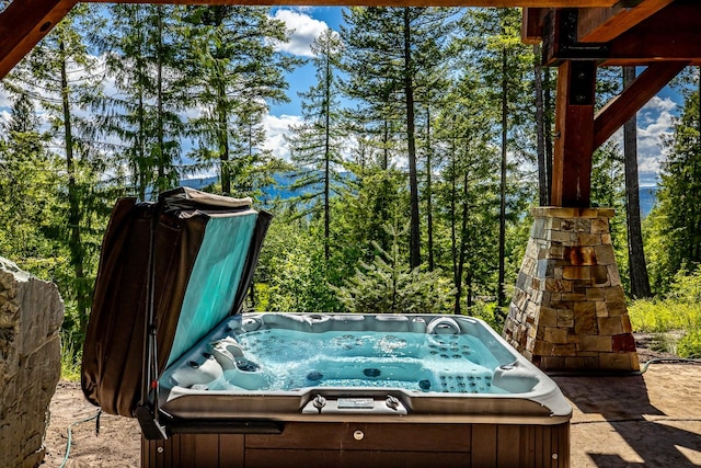 exterior space featuring a hot tub