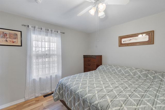 208 40th Ave NE, Great Falls, MT 59404 - bedroom with a ceiling fan and wood finished floors
