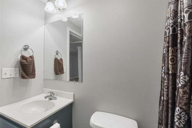 208 40th Ave NE, Great Falls, MT 59404 - bathroom featuring toilet, a shower with shower curtain, and vanity