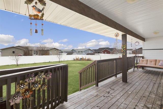 208 40th Ave NE, Great Falls, MT 59404 - wooden deck featuring a lawn, a fenced backyard, and a residential view
