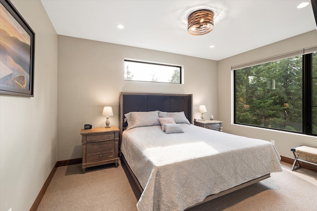 14 Marina Crest Ln, Whitefish, MT 59937 - bedroom with baseboards, light carpet, and recessed lighting