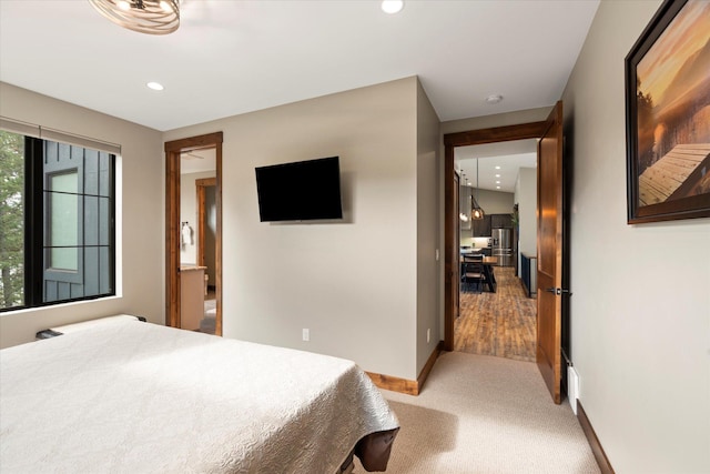 14 Marina Crest Ln, Whitefish, MT 59937 - bedroom with baseboards, recessed lighting, and light carpet