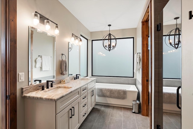 14 Marina Crest Ln, Whitefish, MT 59937 - full bathroom with an inviting chandelier, tile patterned flooring, and a sink
