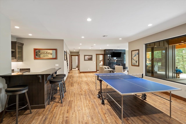 14 Marina Crest Ln, Whitefish, MT 59937 - recreation room featuring recessed lighting, baseboards, a dry bar, and light wood-style flooring