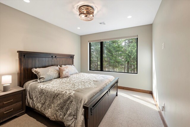 14 Marina Crest Ln, Whitefish, MT 59937 - bedroom featuring baseboards, recessed lighting, visible vents, and light carpet