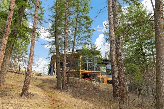 14 Marina Crest Ln, Whitefish, MT 59937 - view of yard with a detached carport and a deck