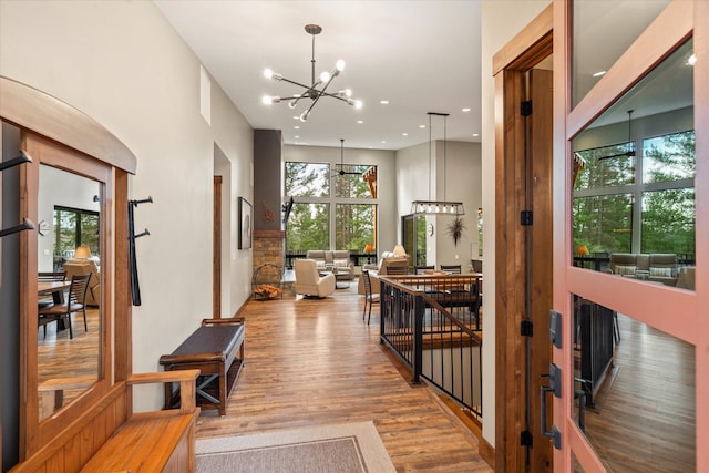 14 Marina Crest Ln, Whitefish, MT 59937 - hall featuring recessed lighting, wood finished floors, and a notable chandelier