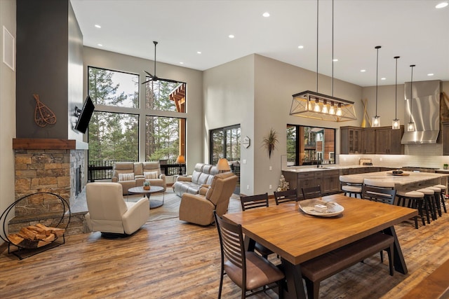 14 Marina Crest Ln, Whitefish, MT 59937 - dining area featuring a high ceiling, recessed lighting, and wood finished floors