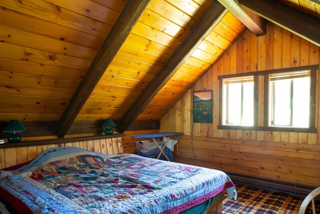 bedroom with wooden walls, wooden ceiling, and lofted ceiling with beams