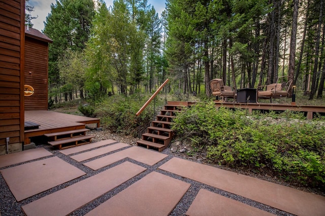 view of patio / terrace with stairs and a wooden deck