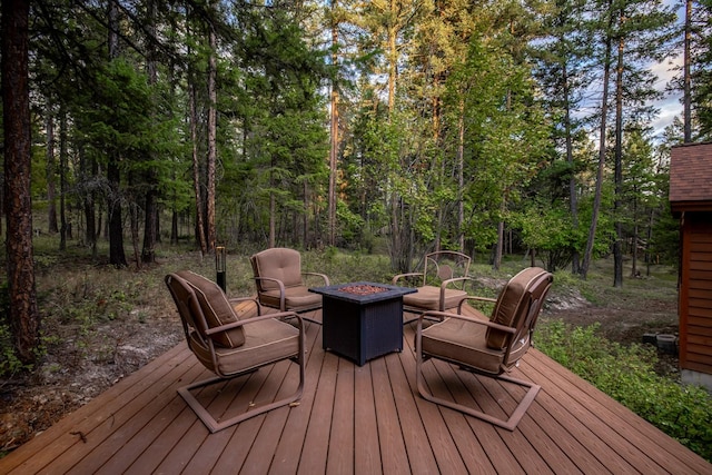 deck with an outdoor fire pit