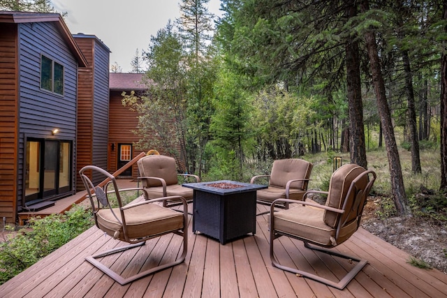 deck with a fire pit