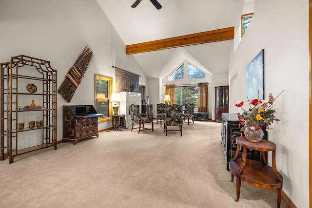 carpeted dining area featuring baseboards, high vaulted ceiling, ceiling fan, and beam ceiling