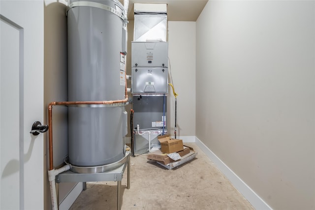 utility room featuring secured water heater