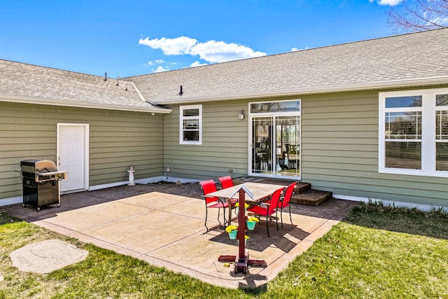 view of patio featuring a grill