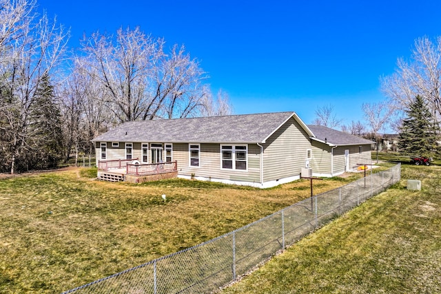 view of front of home featuring a wooden deck, a front yard, a fenced backyard, roof with shingles, and crawl space