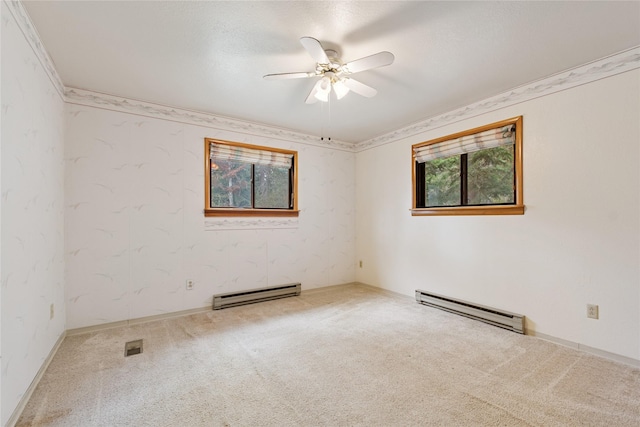 535 Reservoir Rd, Whitefish, MT 59937 - empty room with carpet flooring, a ceiling fan, visible vents, and a baseboard radiator