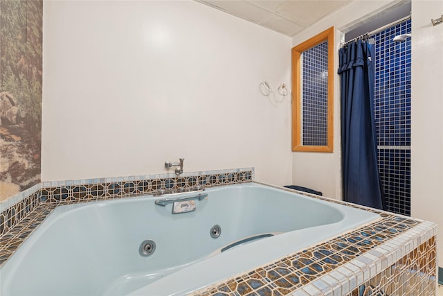 full bath featuring a jetted tub
