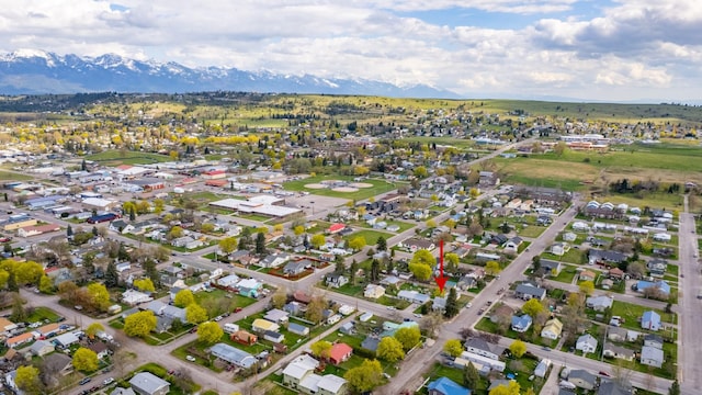 birds eye view of property with a residential view