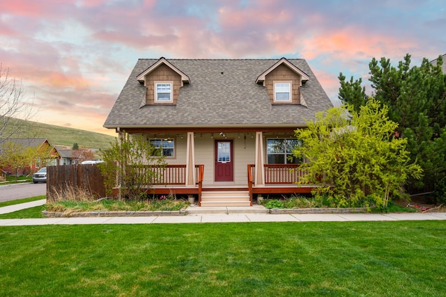 4217 Bordeaux Blvd, Missoula, MT 59808 - view of front of house with roof with shingles, covered porch, and a front yard