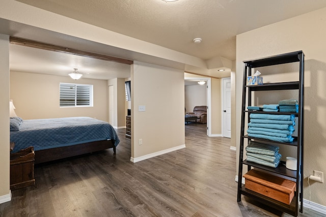 4217 Bordeaux Blvd, Missoula, MT 59808 - bedroom with baseboards and dark wood-style floors