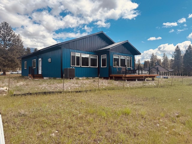 29 Shoreline Dr, Thompson Falls, MT 59873 - view of property exterior featuring a wooden deck, central AC unit, and board and batten siding