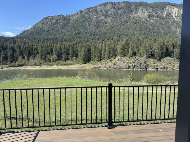 29 Shoreline Dr, Thompson Falls, MT 59873 - view of mountain backdrop with a forest and a large body of water