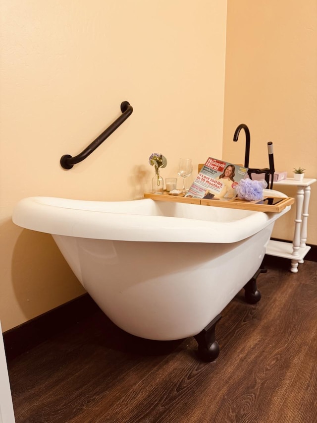 29 Shoreline Dr, Thompson Falls, MT 59873 - bathroom with a freestanding bath, wood finished floors, and baseboards