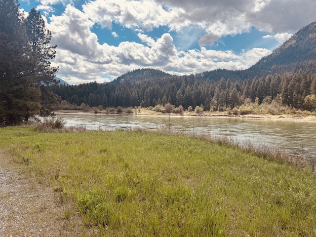 29 Shoreline Dr, Thompson Falls, MT 59873 - mountain view featuring a forest and a nearby body of water