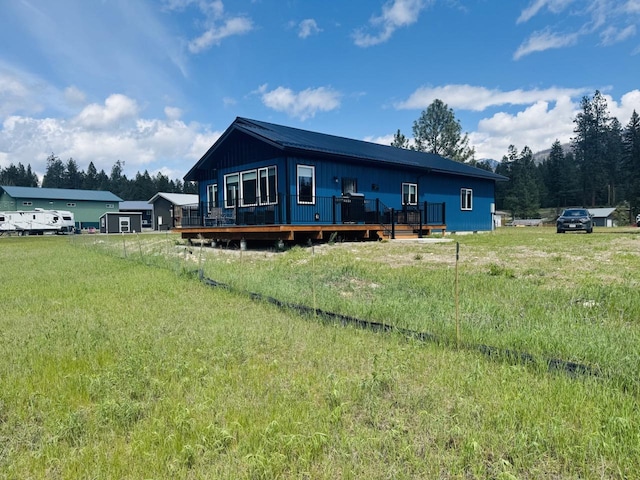 29 Shoreline Dr, Thompson Falls, MT 59873 - view of front facade with a wooden deck