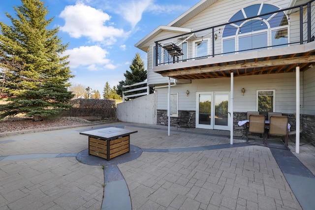 2301 Larkspur Ln, Great Falls, MT 59404 - view of patio featuring outdoor dining area and a balcony