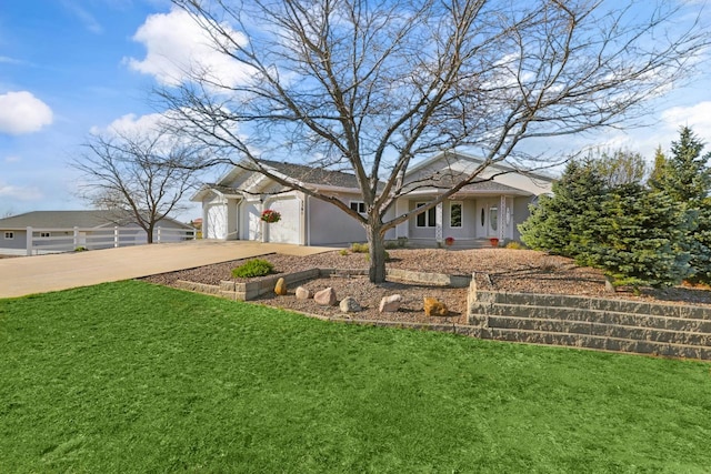2301 Larkspur Ln, Great Falls, MT 59404 - ranch-style home featuring stucco siding, a garage, driveway, and a front lawn