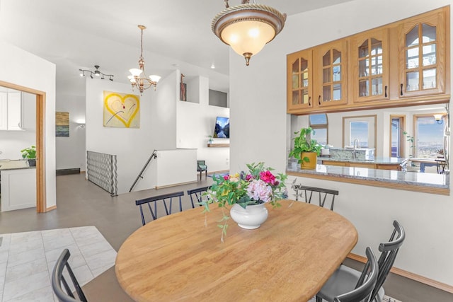 2301 Larkspur Ln, Great Falls, MT 59404 - dining area featuring a chandelier