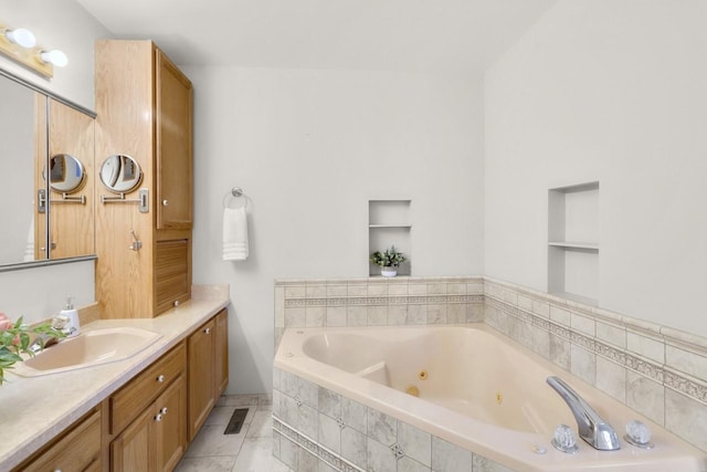 2301 Larkspur Ln, Great Falls, MT 59404 - full bathroom with vanity, a tub with jets, and built in shelves