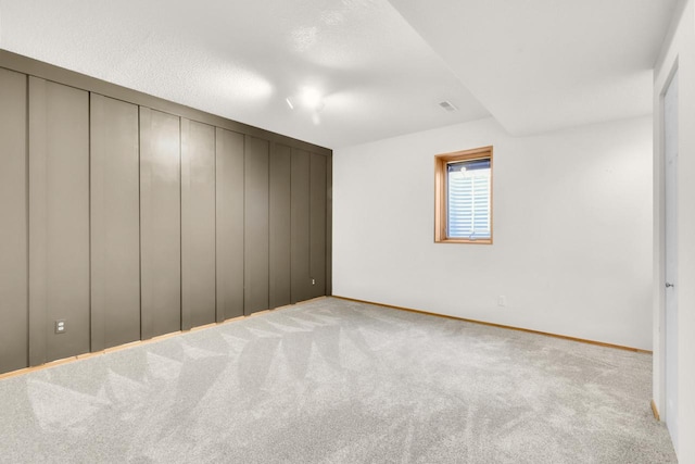 2301 Larkspur Ln, Great Falls, MT 59404 - unfurnished bedroom featuring carpet floors, baseboards, and visible vents