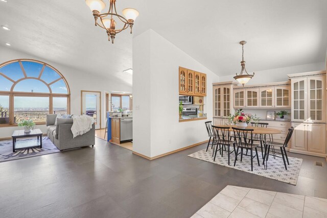2301 Larkspur Ln, Great Falls, MT 59404 - dining room featuring an inviting chandelier, lofted ceiling, and a wealth of natural light