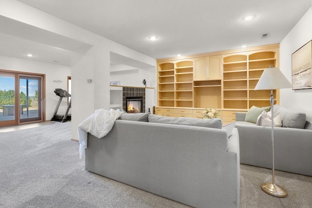 2301 Larkspur Ln, Great Falls, MT 59404 - living room with recessed lighting, visible vents, a tiled fireplace, and carpet