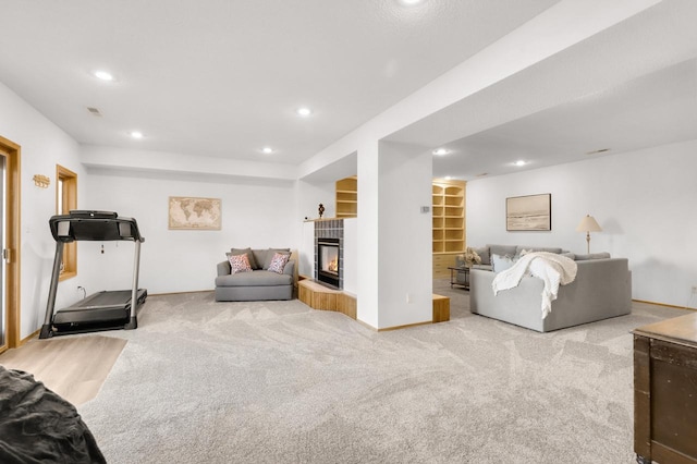 2301 Larkspur Ln, Great Falls, MT 59404 - living area with carpet floors, recessed lighting, and a tiled fireplace