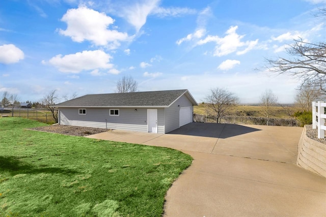 2301 Larkspur Ln, Great Falls, MT 59404 - detached garage featuring fence and driveway