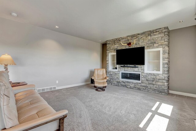 5010 Jeff Dr, Missoula, MT 59803 - carpeted living room featuring baseboards, visible vents, and a fireplace