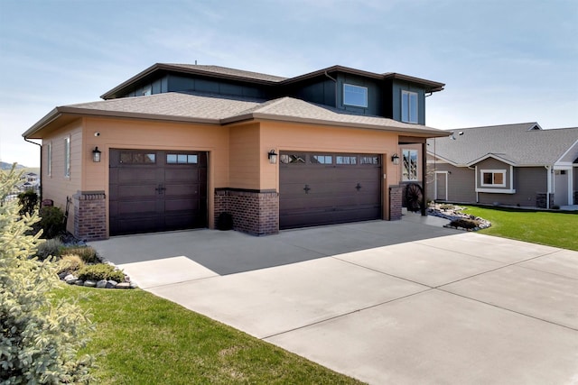 5010 Jeff Dr, Missoula, MT 59803 - prairie-style house with brick siding, a front lawn, and concrete driveway